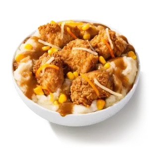 KFC Mashed Potato Bowl (Famous Bowl): mashed potatoes, brown gravy, sweet corn, crispy chicken nuggets, three-cheese blend